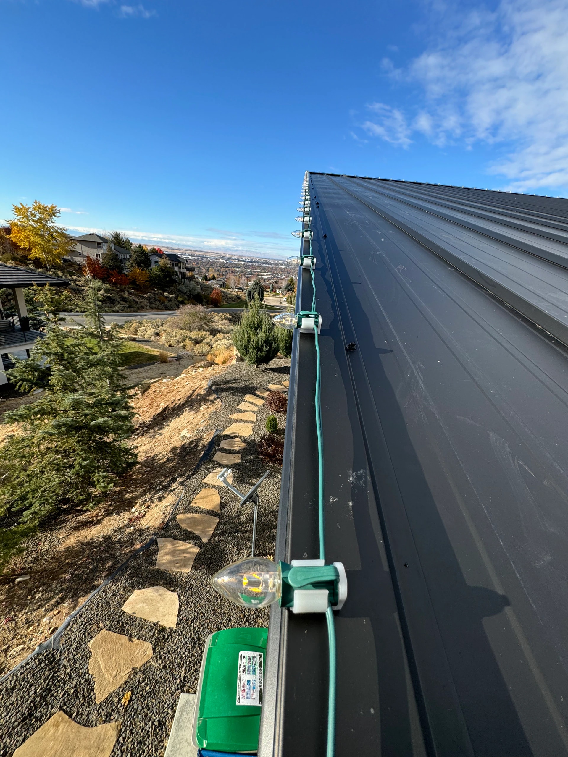 Christmas lights installed along a standing-seam metal roof in Boise, ID by Christmas Light Installation Boise