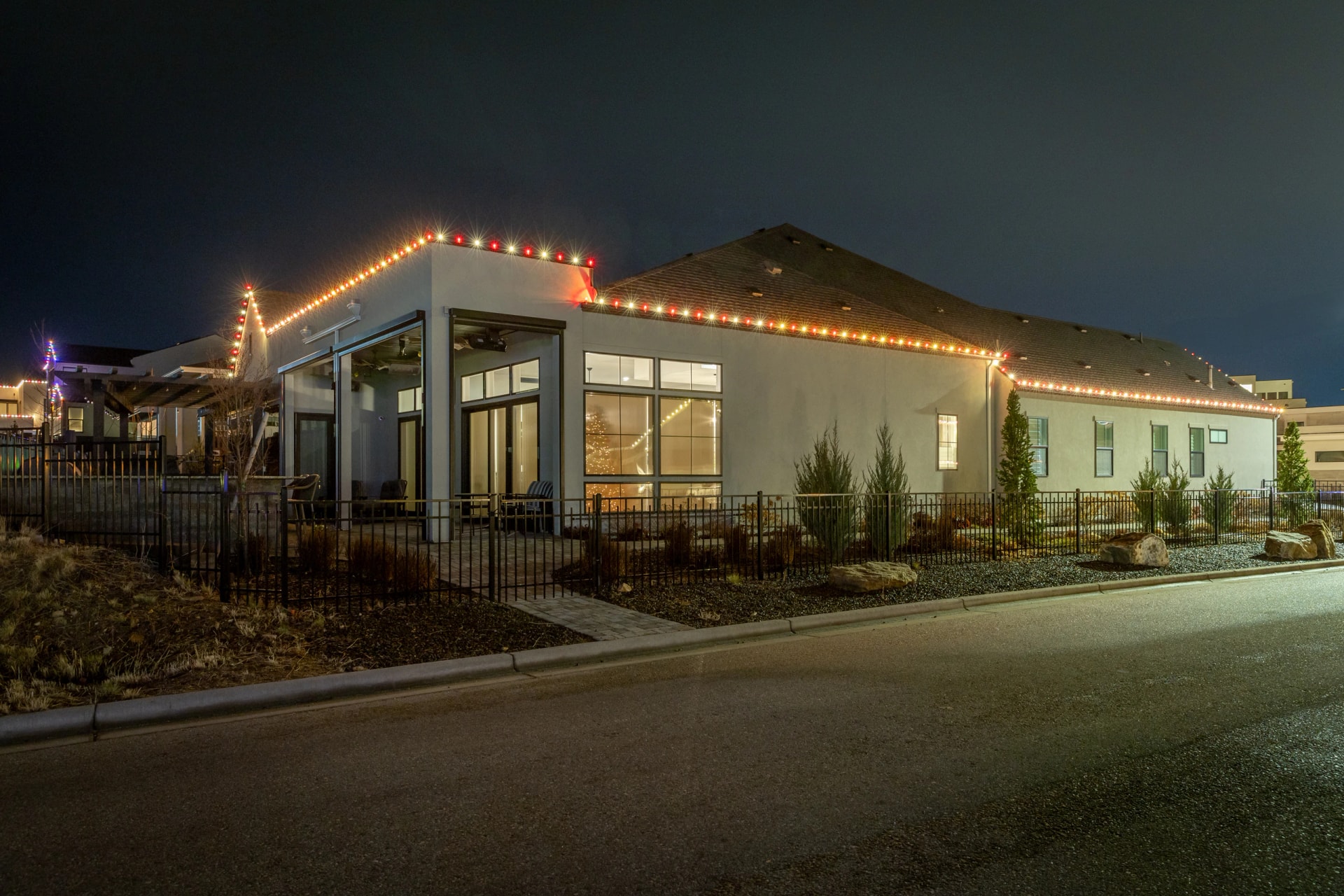 Commercial building red roofline Christmas light installation in Boise, ID by Christmas Light Installation Boise