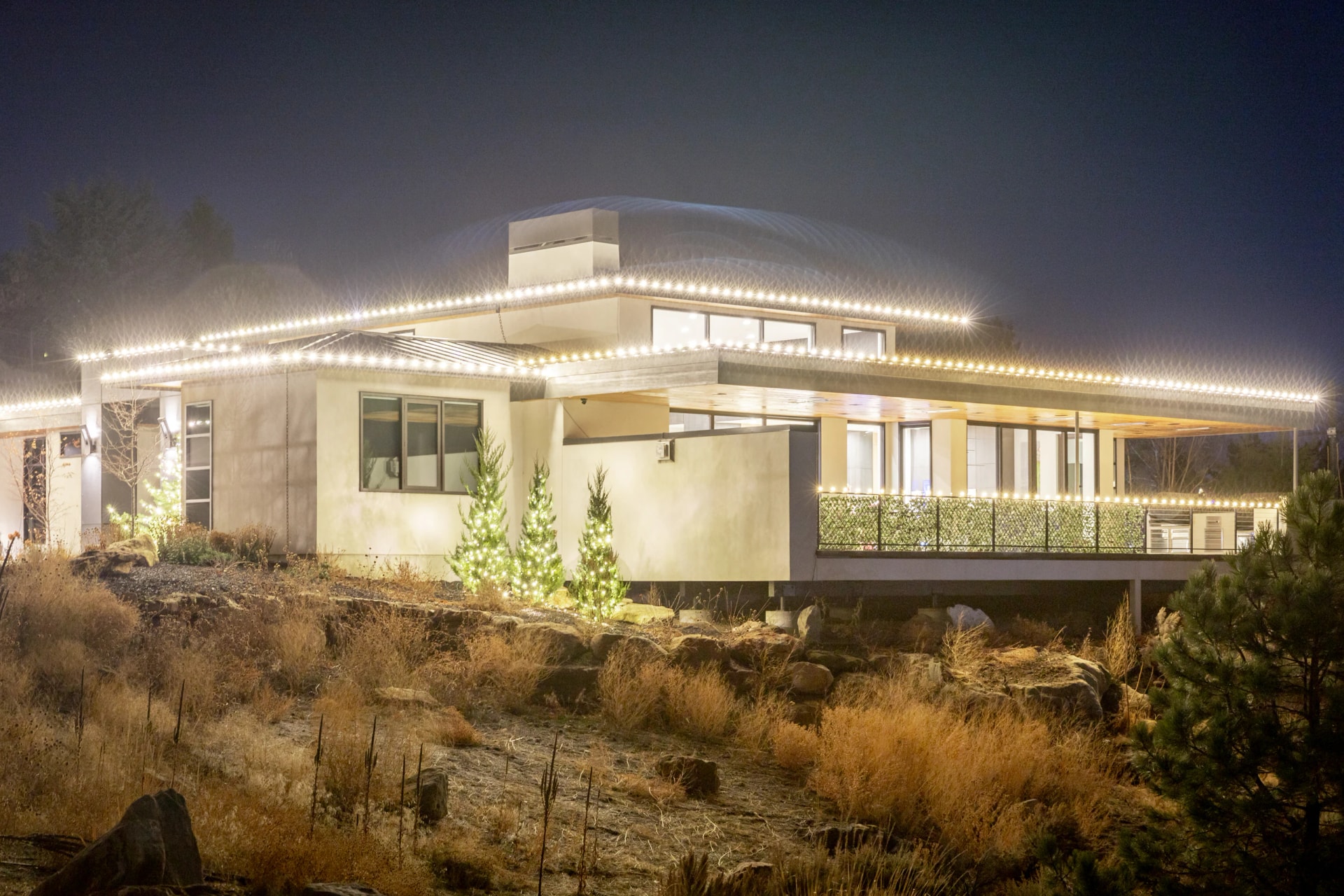 Luxury hillside home warm-white Christmas light installation in Boise, ID by Christmas Light Installation Boise