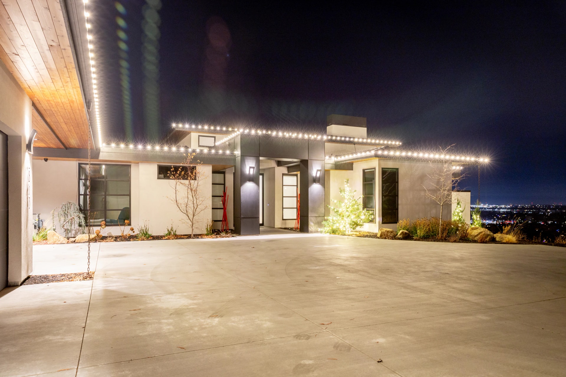 Modern home entryway warm-white Christmas light installation in Boise, ID by Christmas Light Installation Boise