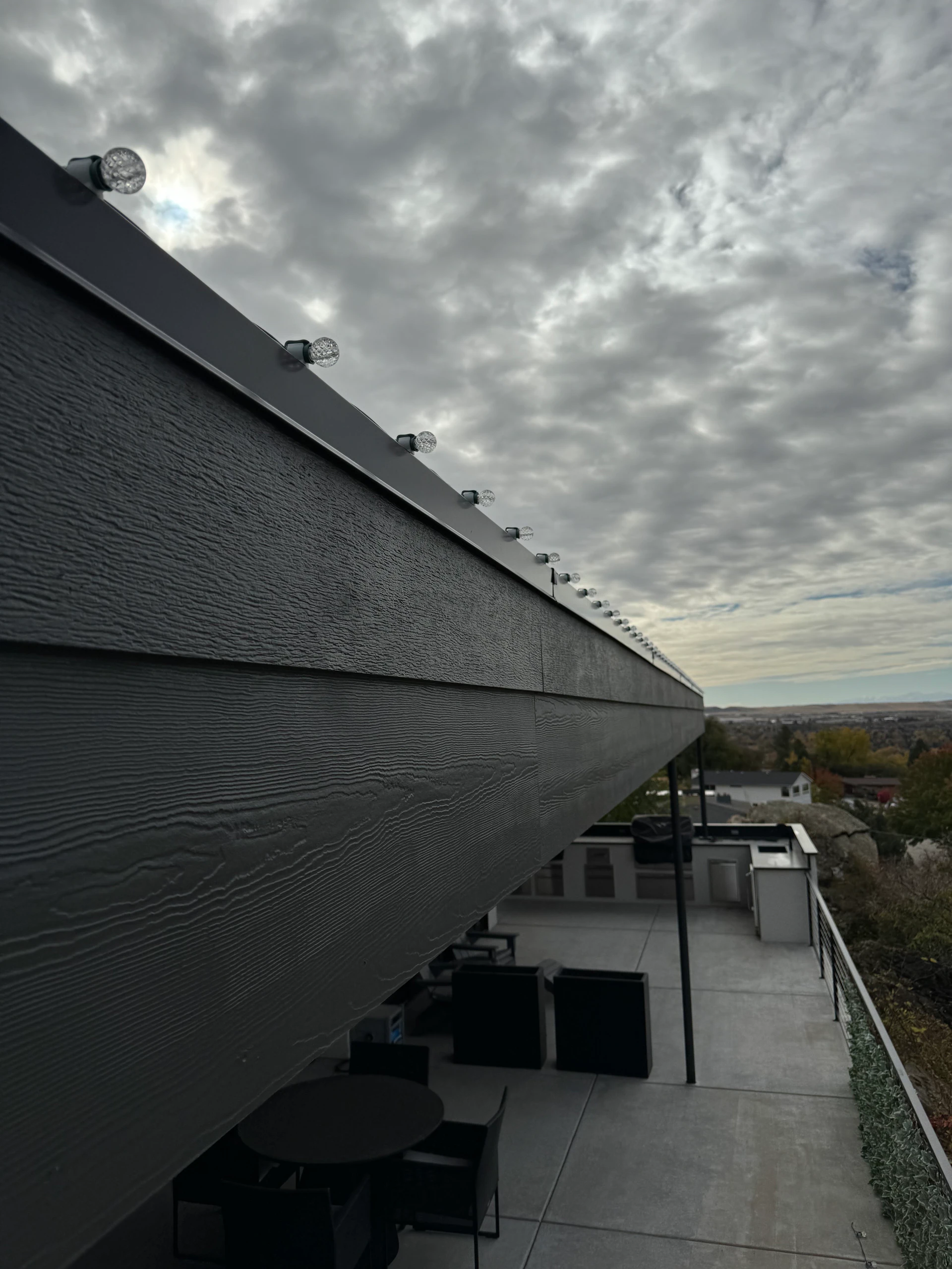 Patio overhang C9 Christmas light installation on a modern home in Boise, ID by Christmas Light Installation Boise