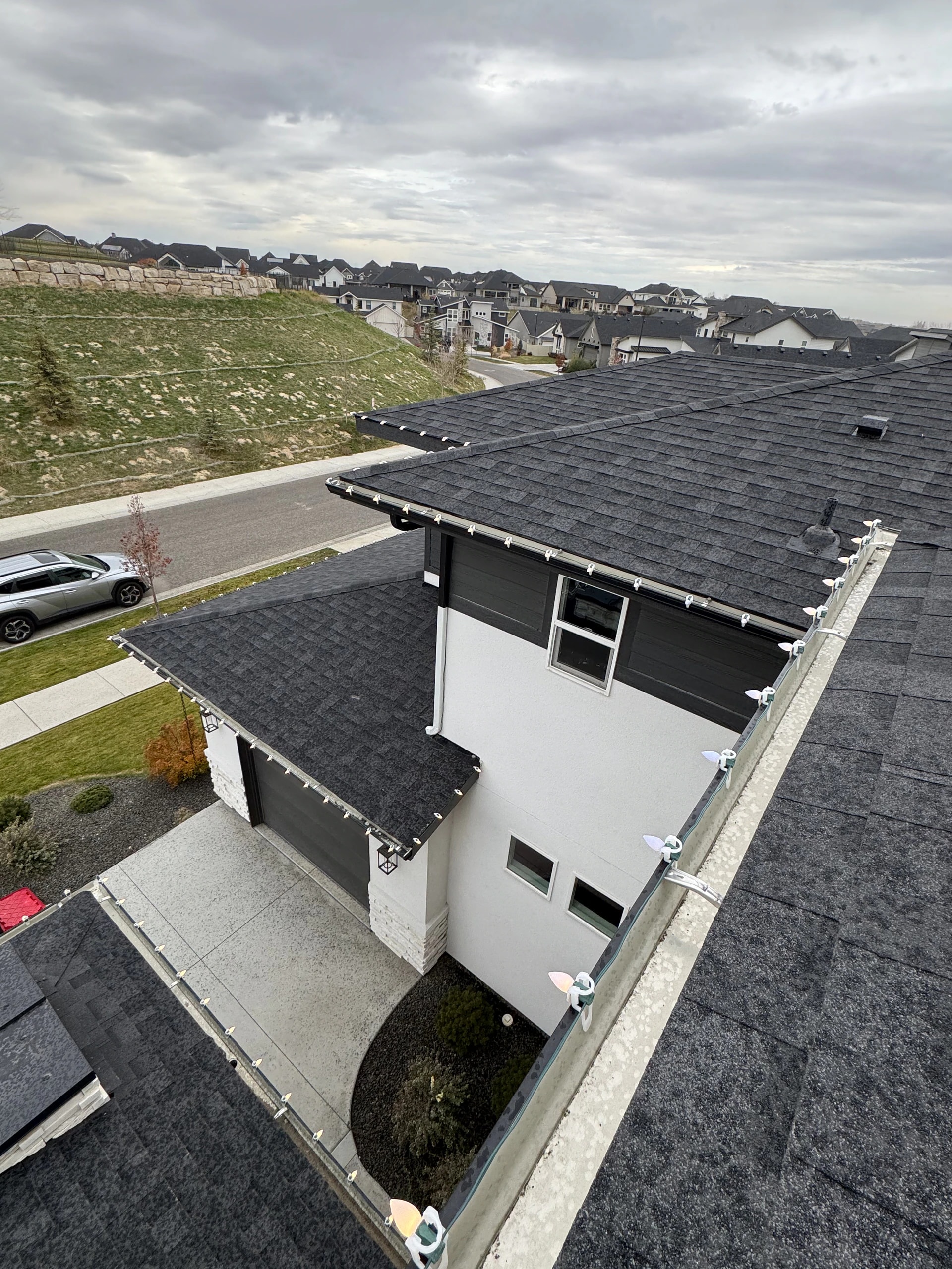 Two-story home full roofline Christmas light installation in Boise, ID by Christmas Light Installation Boise